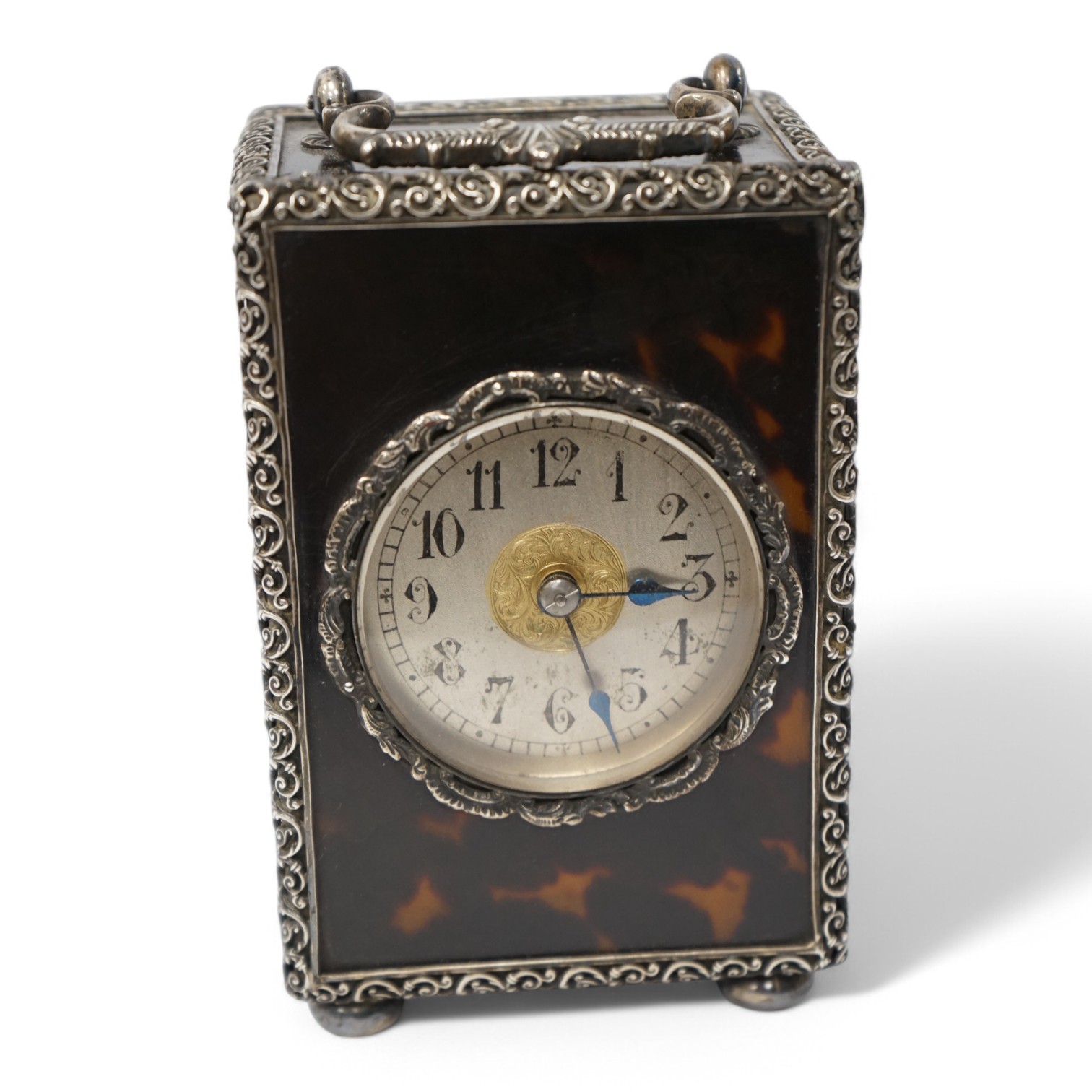 A late 19th century French tortoiseshell carriage clock, with white metal mounts, 15cm high. Condition - good, untested but currently ticking